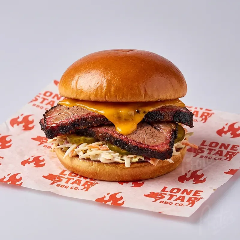 Texas brisket burger on printed greaseproof paper